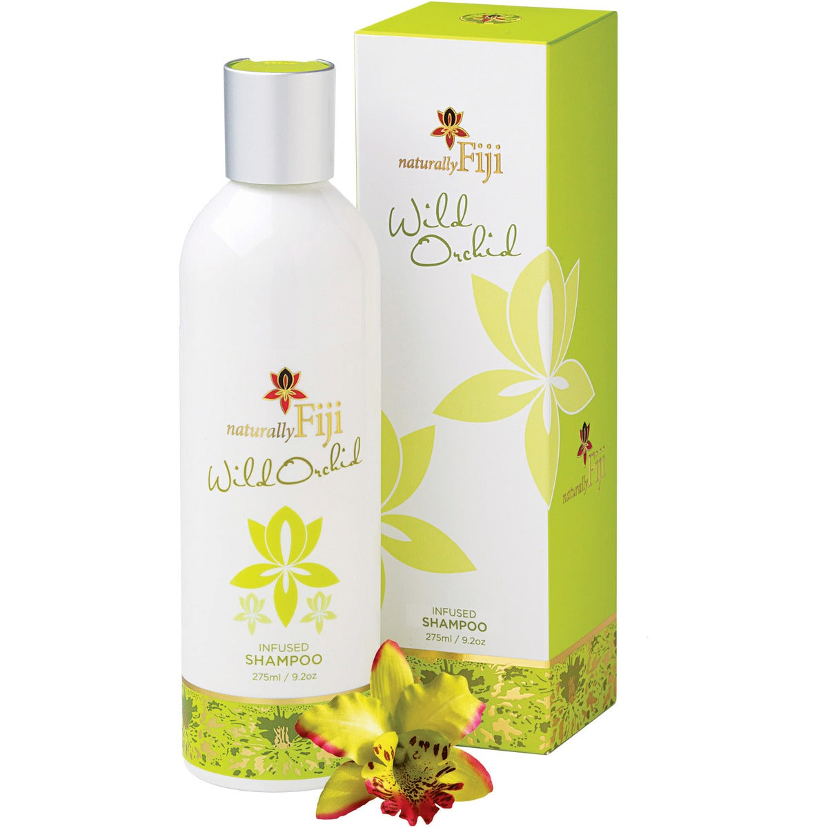 A bottle of naturally Fiji Wild Orchid infused shampoo next to its green and white packaging box, with a yellow and red orchid flower in the foreground on a white background.